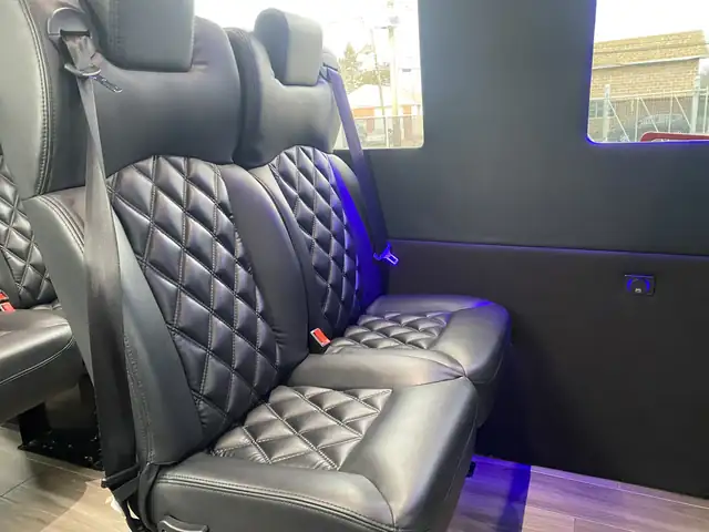 Executive Sprinter close view of a diamond-stitched leather bench with a three-point seatbelt — Cruise Terminal Transportation NYC