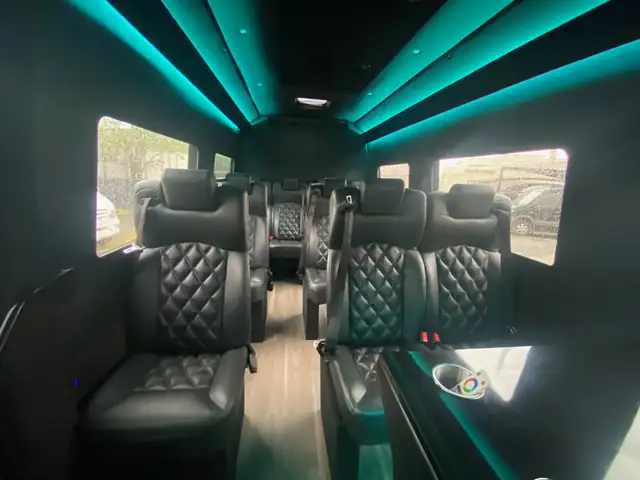 Executive Sprinter with teal ceiling light beams and diamond-stitched black leather seats — About Mercedes Sprinter NYC