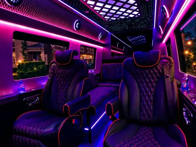 Jet Sprinter with a purple lit lattice ceiling and tufted captain chairs along the windows — Manhattan to Washington, DC transfers