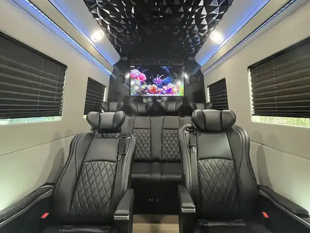 Jet Sprinter with black leather captain chairs, a black faceted ceiling and downlights — New Jersey Sprinter service